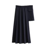 Jupe asymétrique plissée bleu marine. Longue à droite courte à gauche