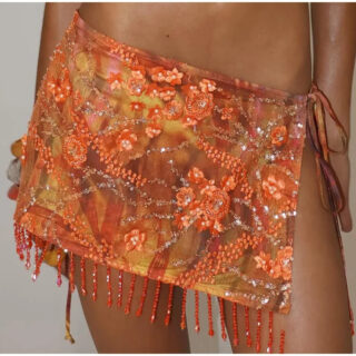 Jupe de Bain Orange à Paillettes sur une femme